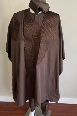A premium modern traditional African men wear Agbada set in charcoal grey featuring embellished detailing.