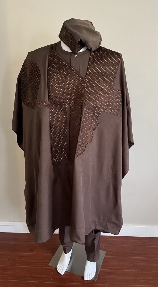 A premium modern traditional African men wear Agbada set in charcoal grey featuring embellished detailing.