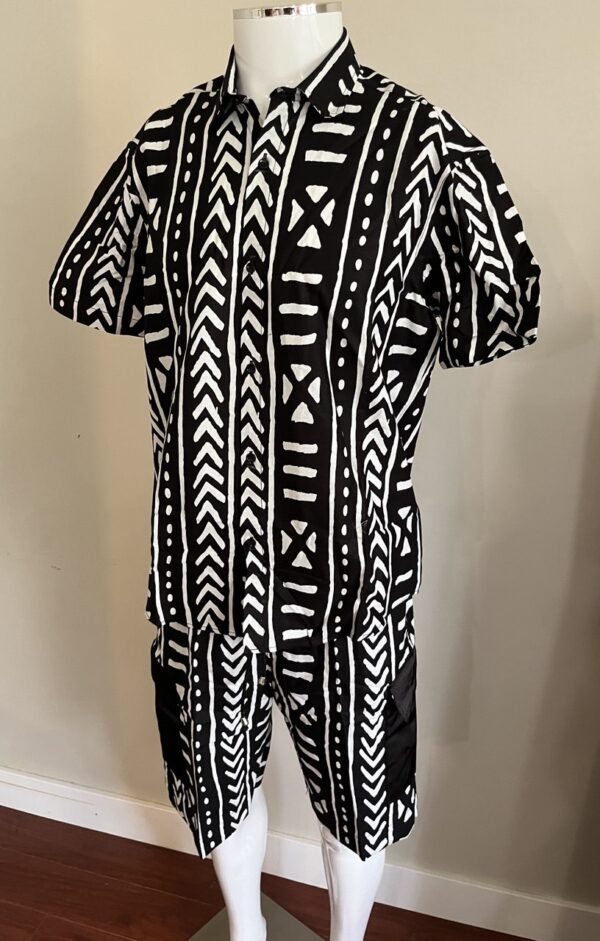 A mannequin displaying a premium 100% cotton men's african print set featuring cargo shorts and a short-sleeve button-down shirt.