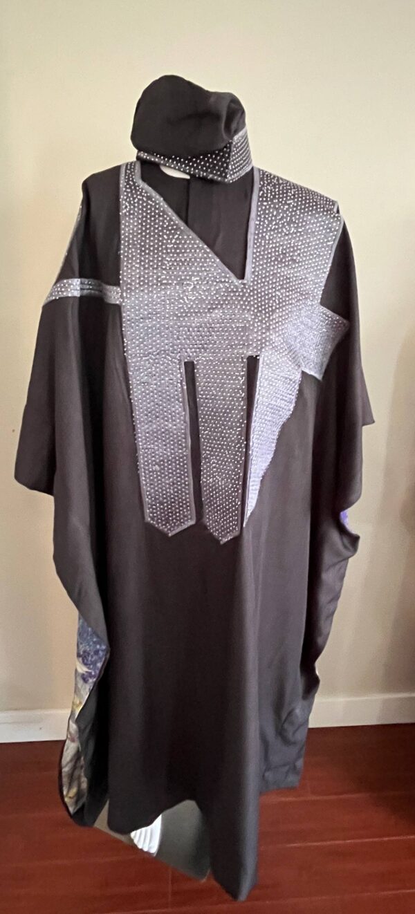 A mannequin displaying a premium luxury Agbada set in coffee brown with intricate stonework detailing